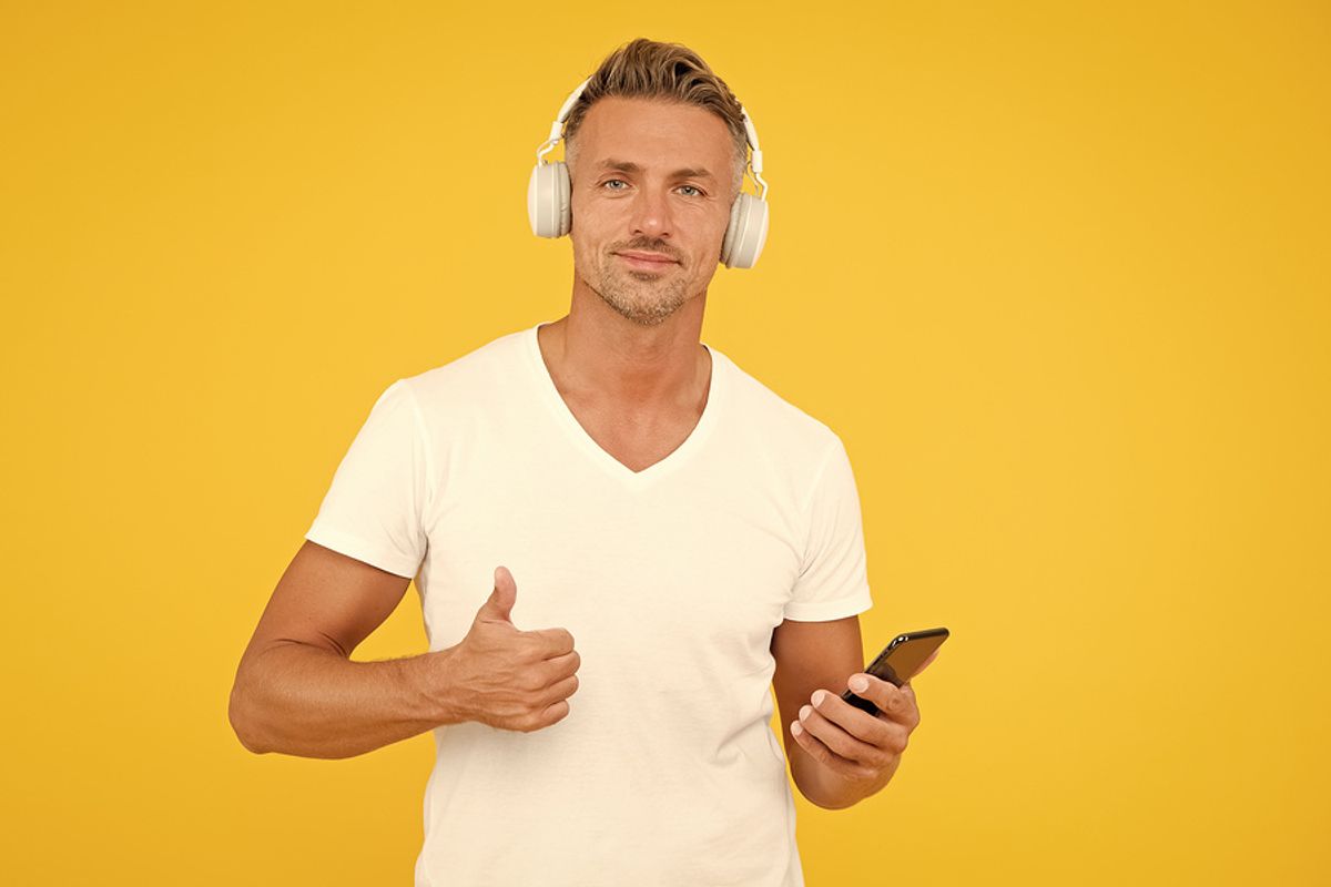 Man listens to inspiring podcast episodes