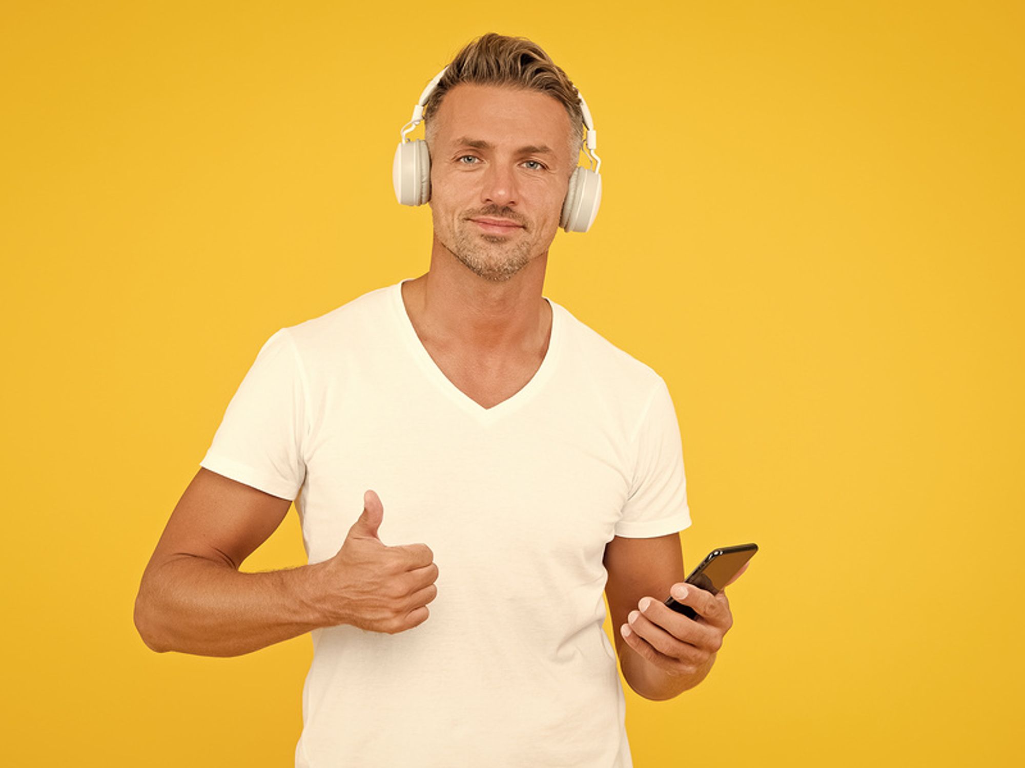 Man listens to inspiring podcast episodes