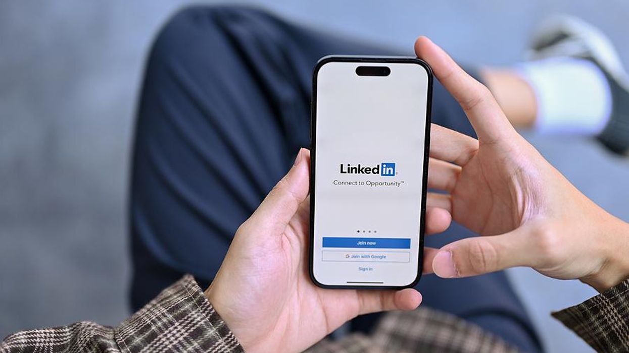 Man logs in to LinkedIn to update his profile