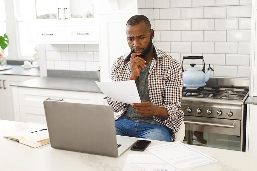 Man looks for a job at home