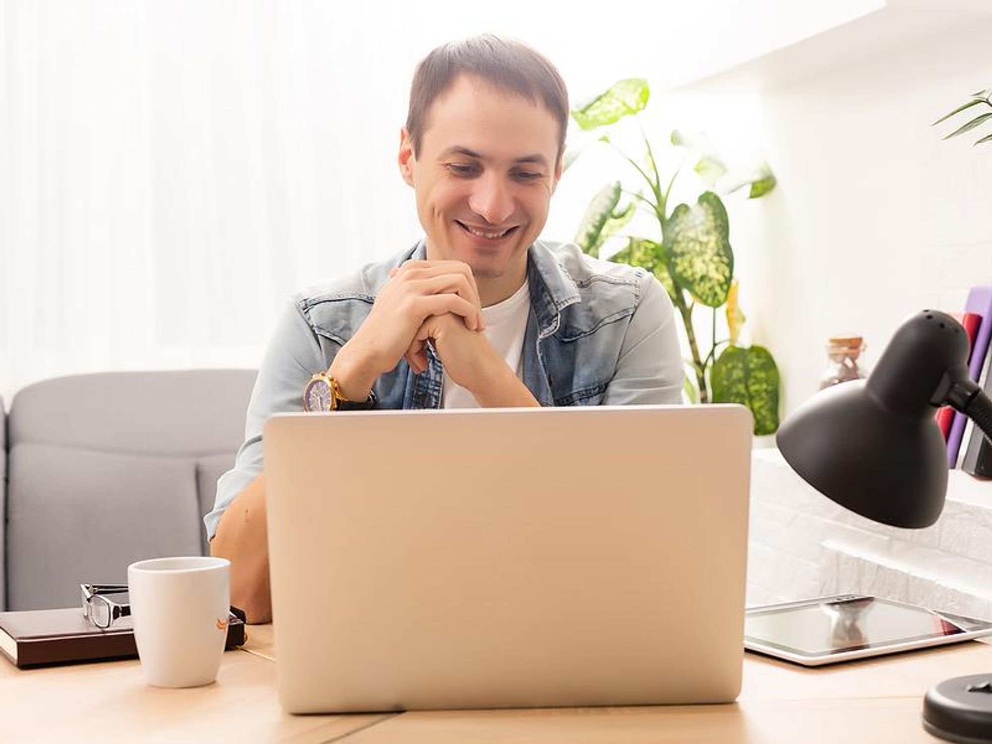 Man looks up who's hiring and laying off employees