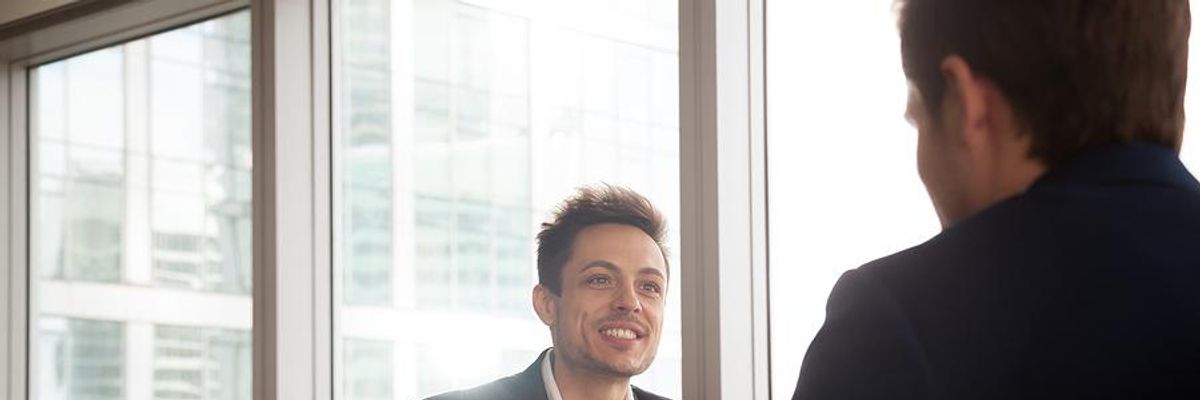 Man makes a sales presentation at work