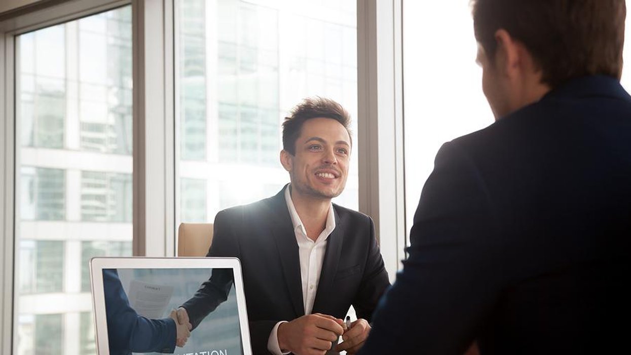 Man makes a sales presentation at work