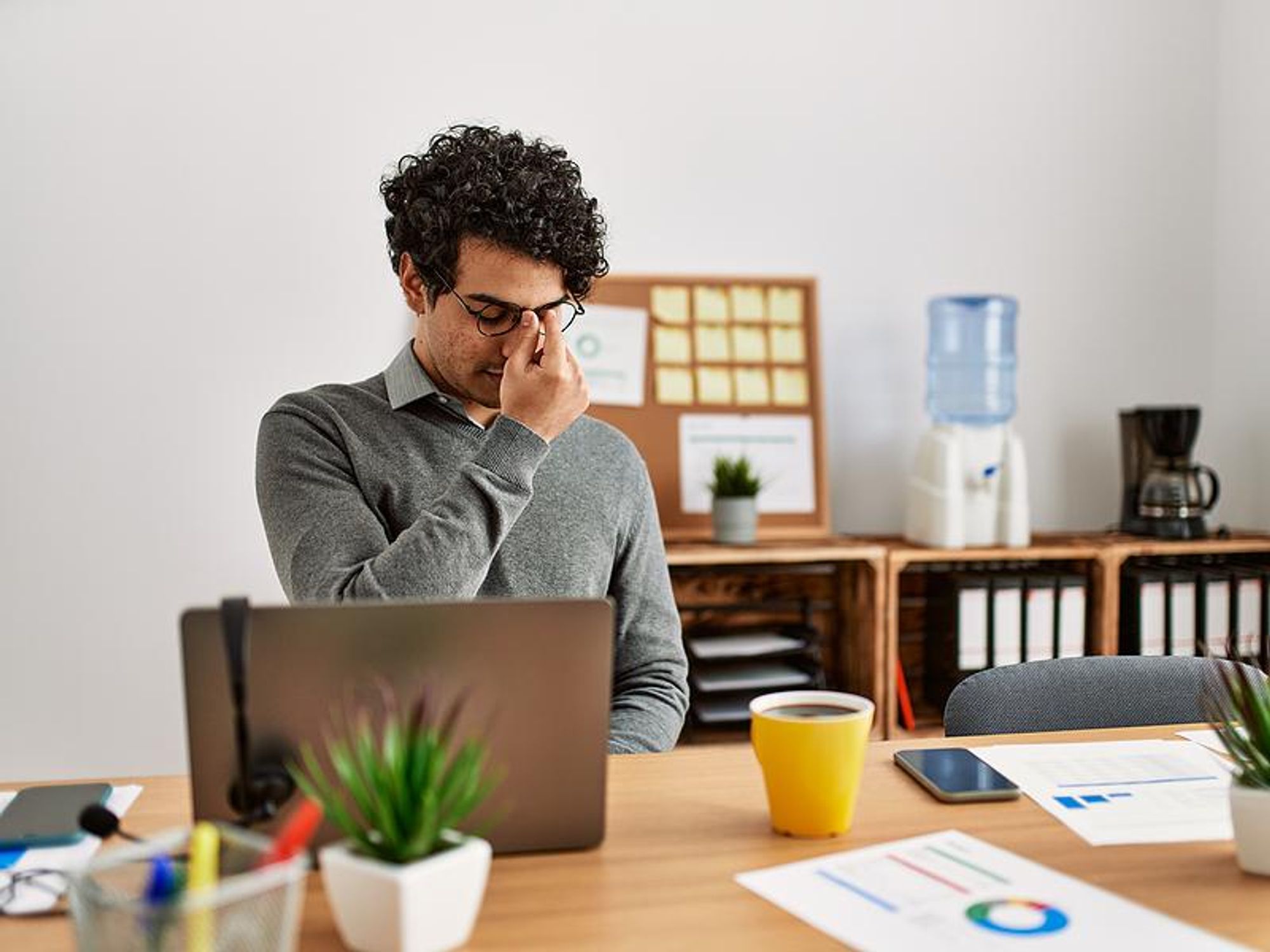 Man miserable at work