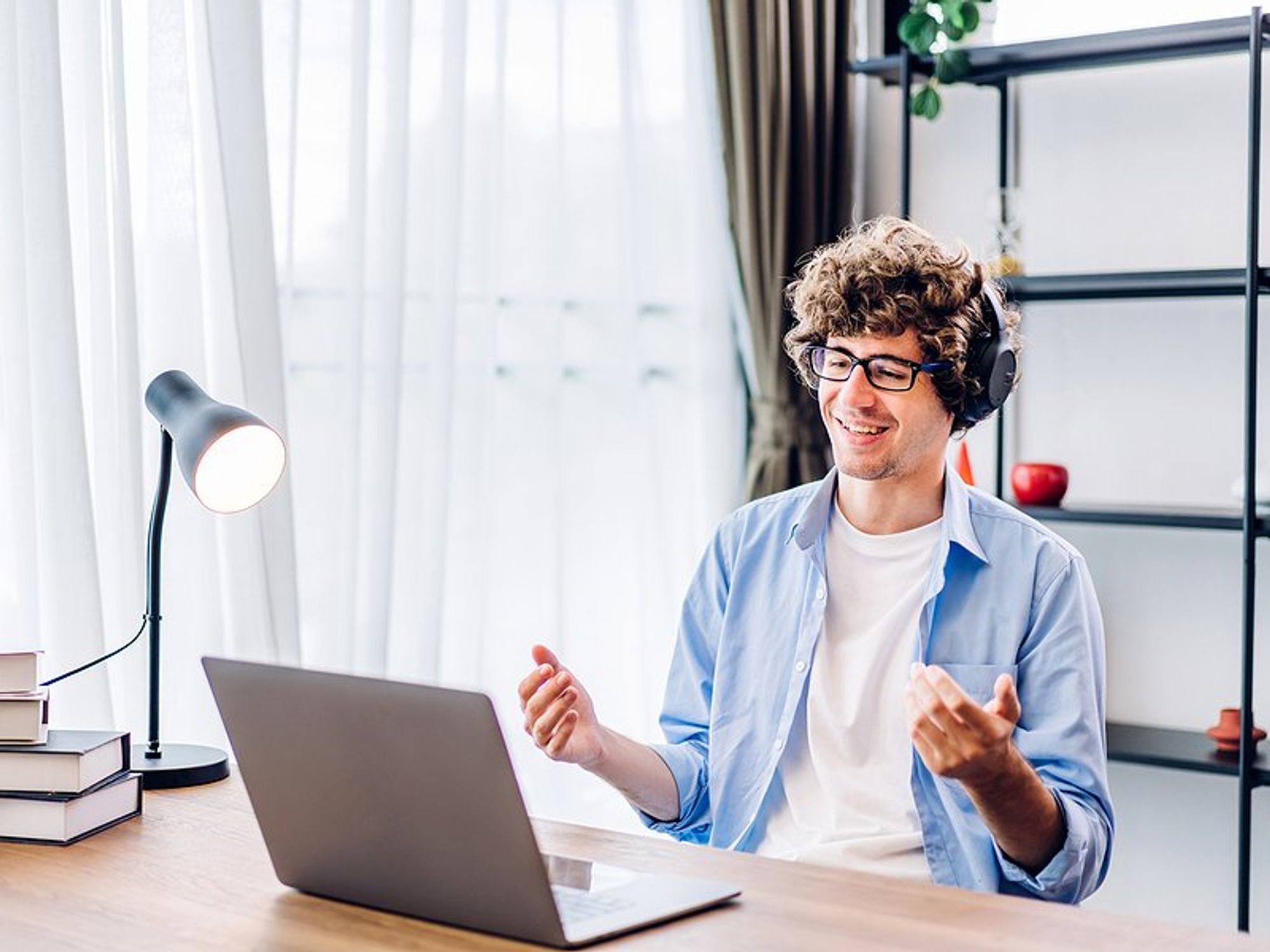 Man on laptop develops his skills on the job