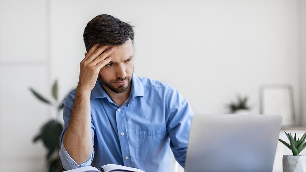 Man on laptop realizes he got ghosted by a LinkedIn connection