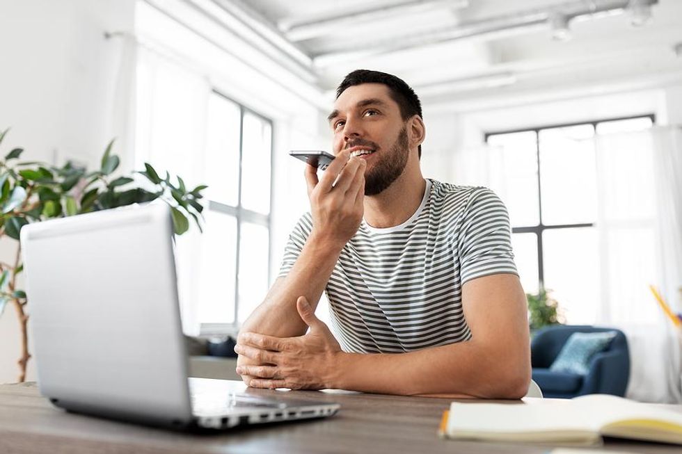 Man on laptop researches companies for his proactive job search