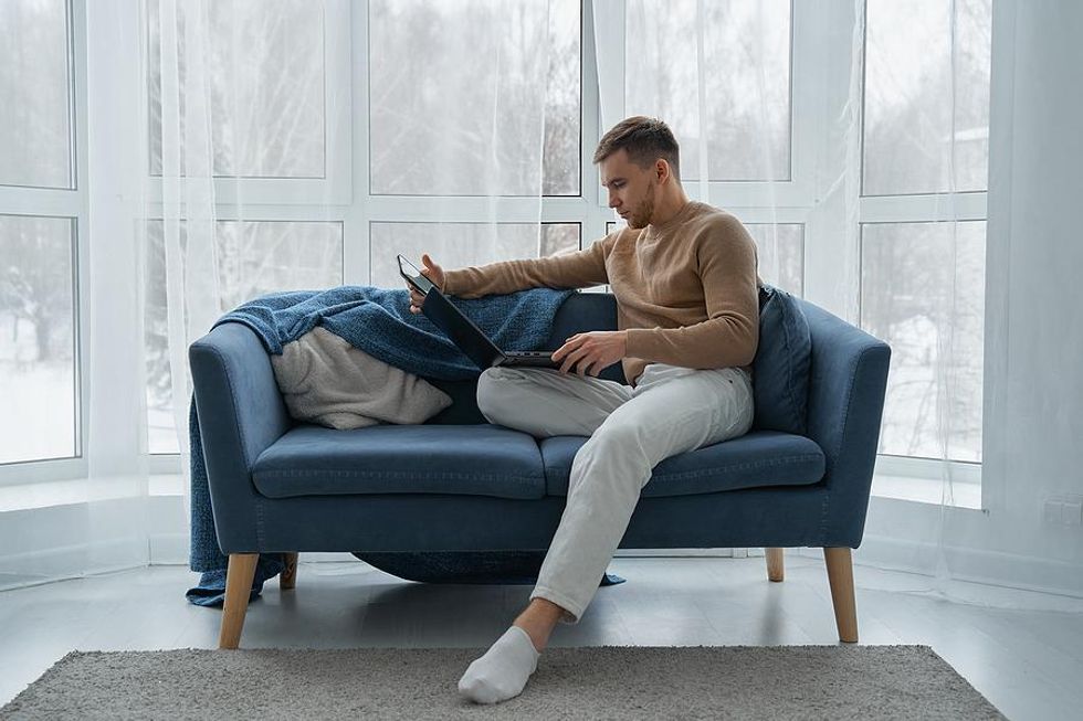 Man on laptop tries to connect with a recruiter on LinkedIn