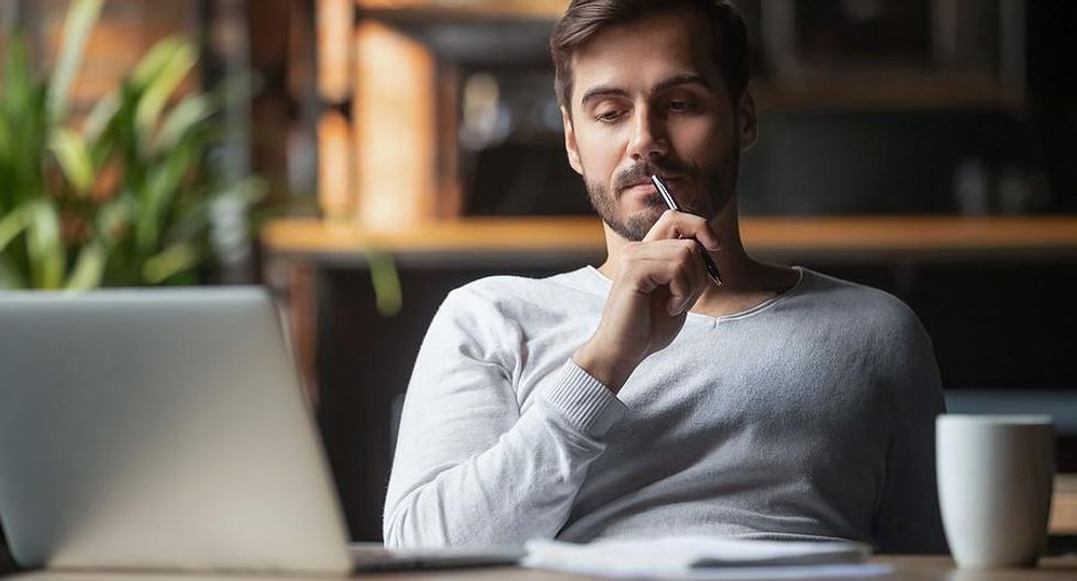Man on laptop wonders why a LinkedIn connection hasn't messaged him back
