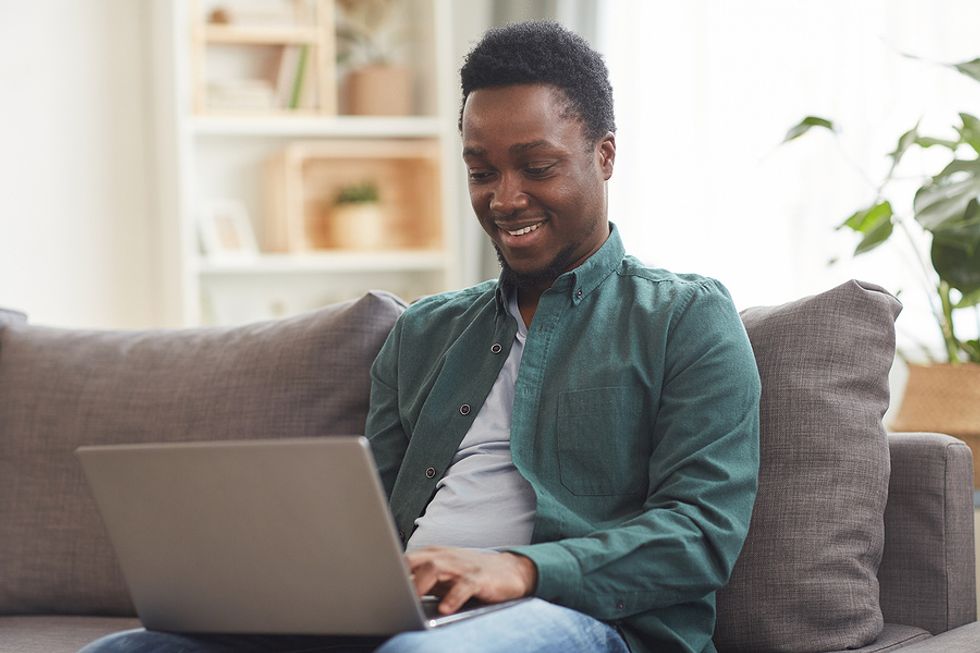 Man on laptop writes a message to a new LinkedIn connection