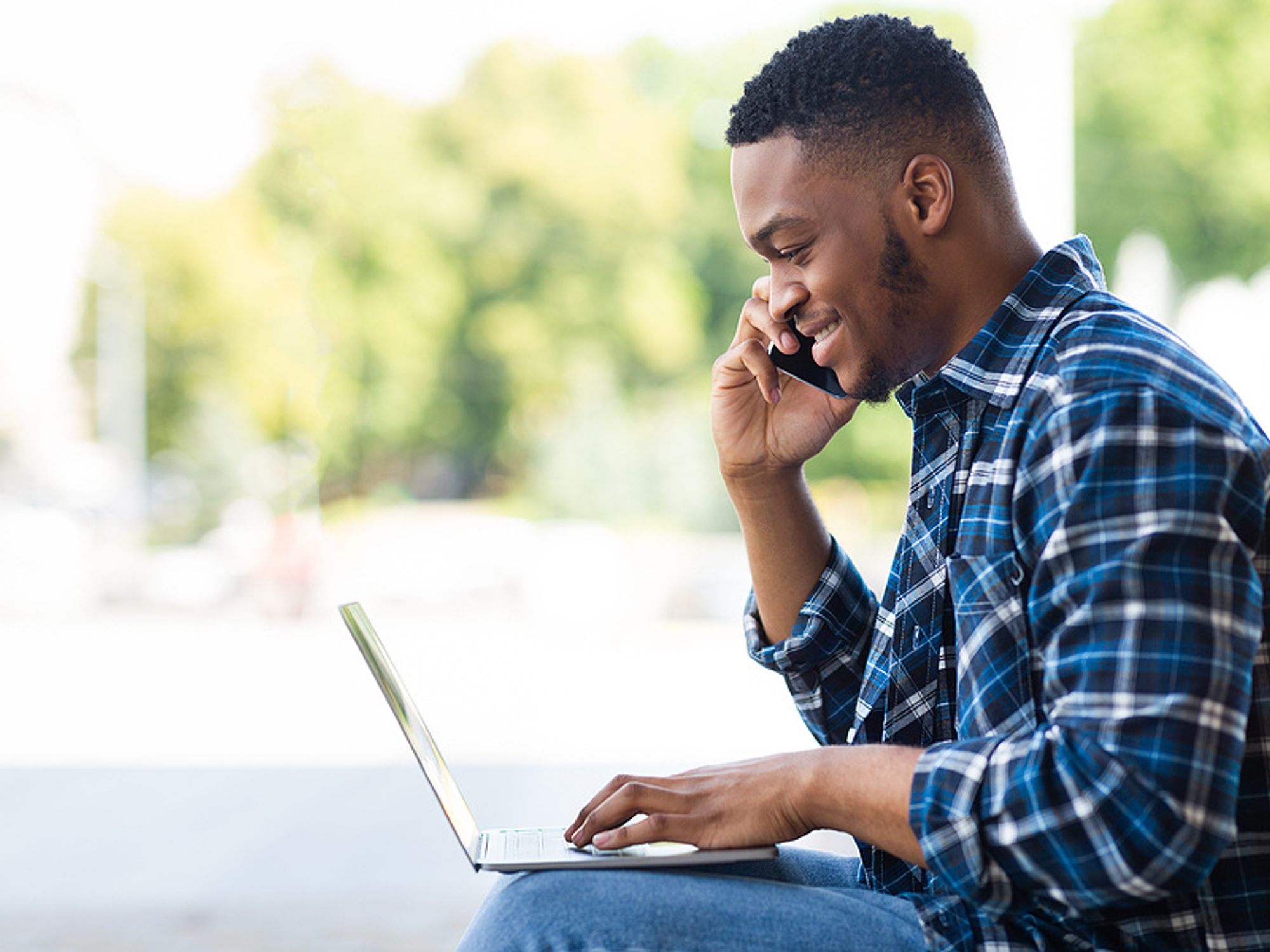 Man on the phone with a company that's hiring
