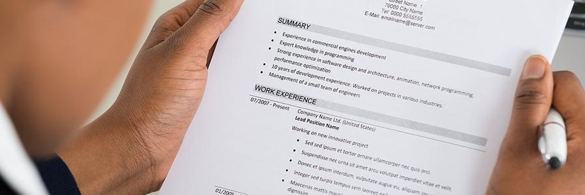 Man reads a resume