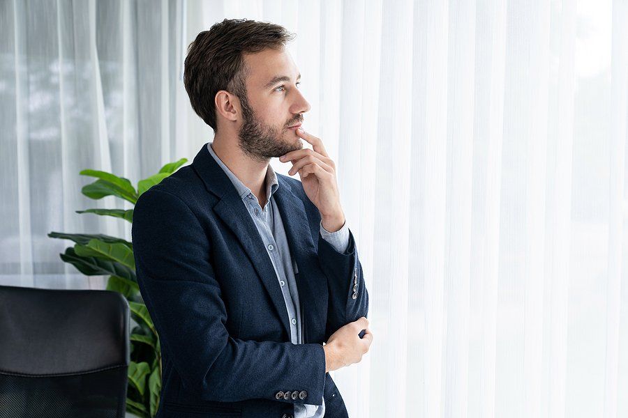 Man reflects at work and thinks he chose the wrong career