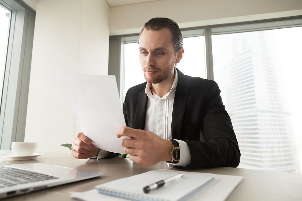 Man reviews his resume as he tries to relaunch his career