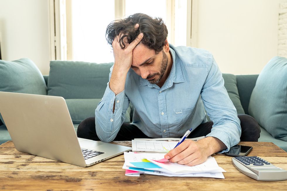 Man stressed about paying his mortgage