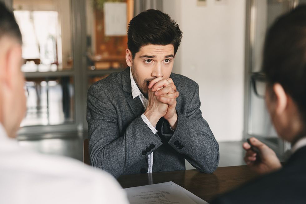 Man stressed out during a job interview