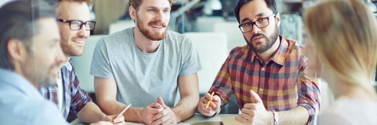 Man talks during a work meeting