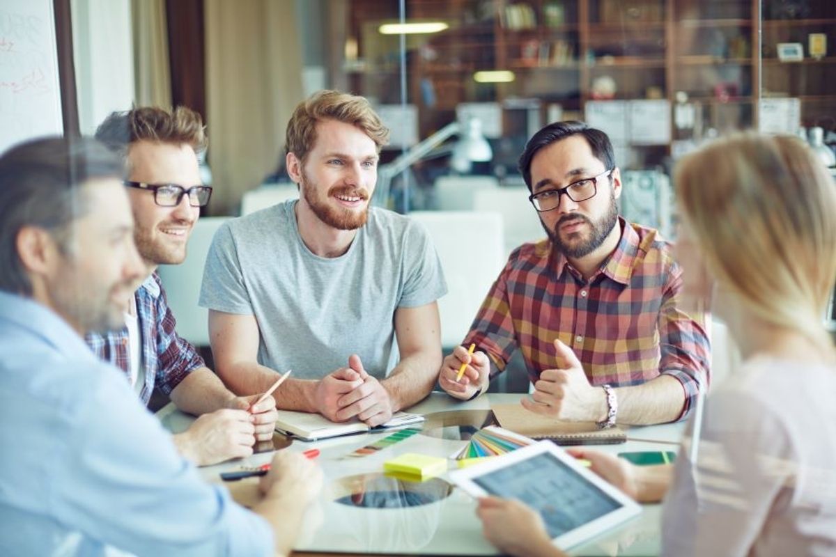 Man talks during a work meeting
