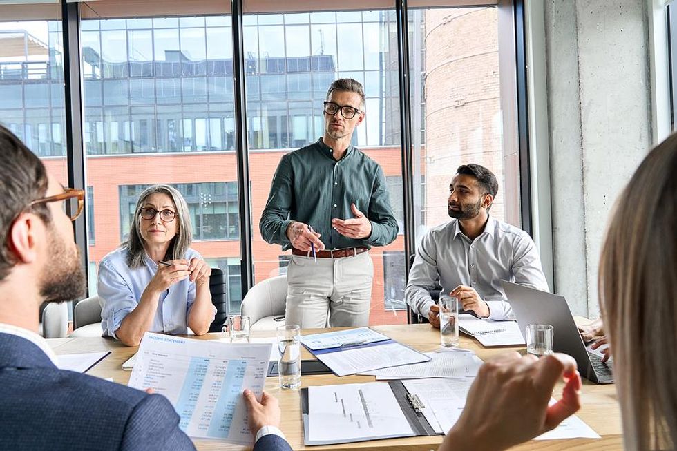 Man talks during a work meeting