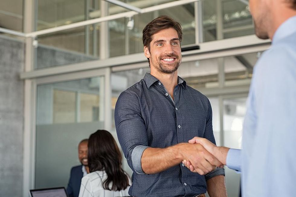 Man talks to a coworker