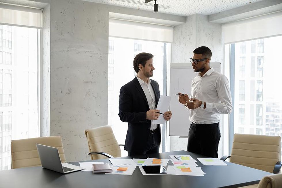 Man talks to his mentor about job burnout