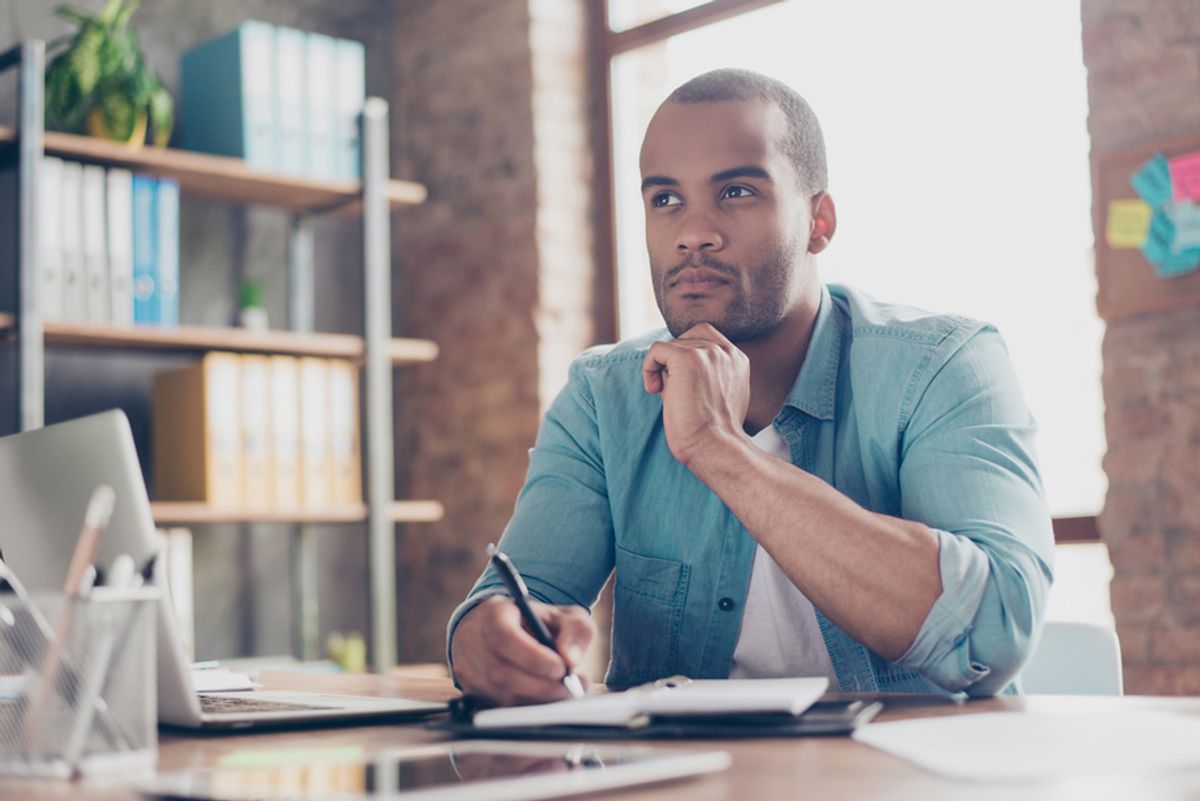 Man thinking about the doubts he has about his college degree