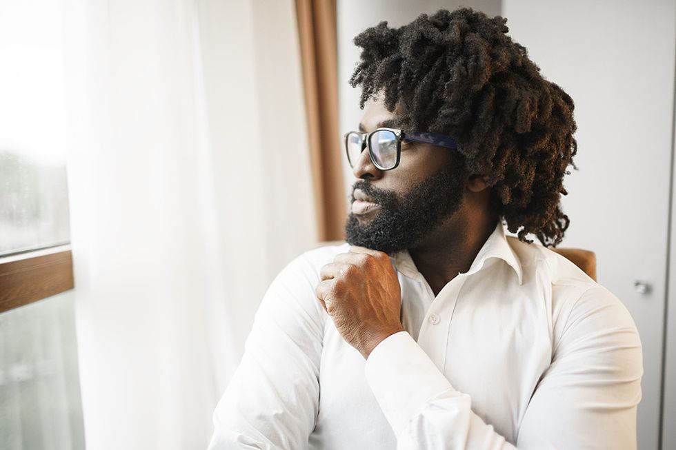 Man thinks about his career goals while unemployed