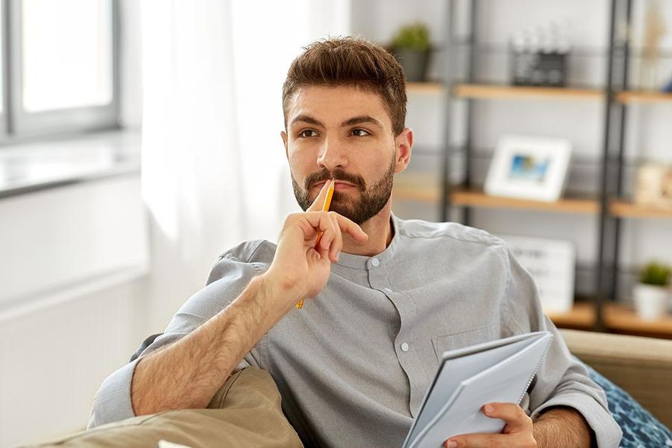 Man thinks about his work goals