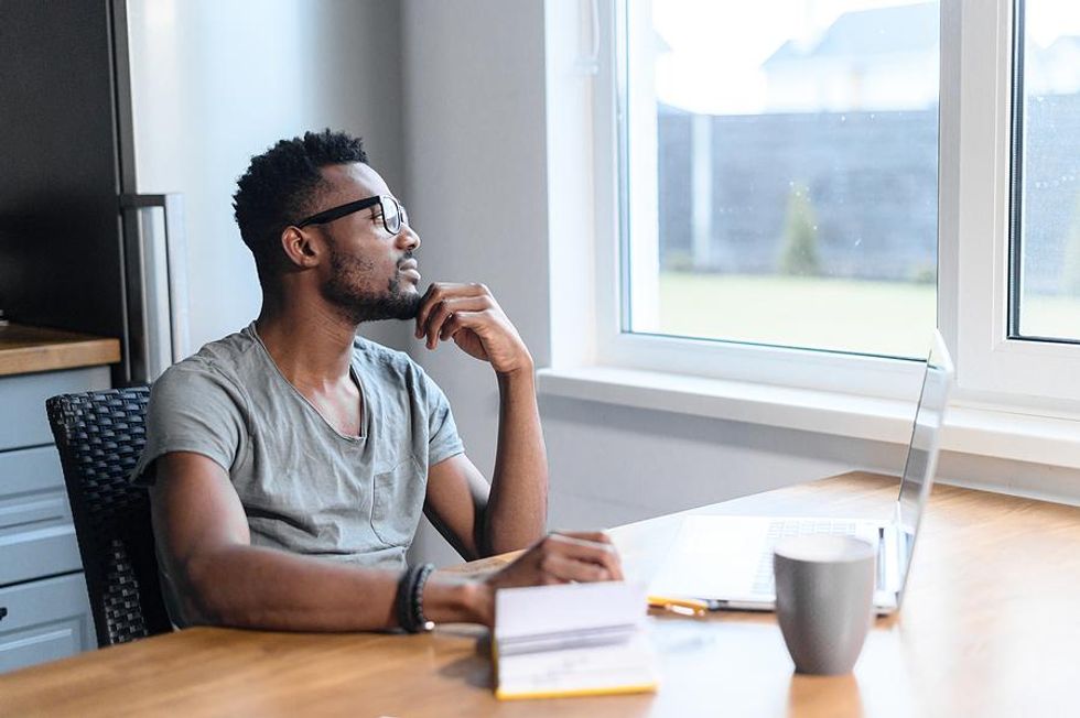 Man thinks about which skills to include on his resume