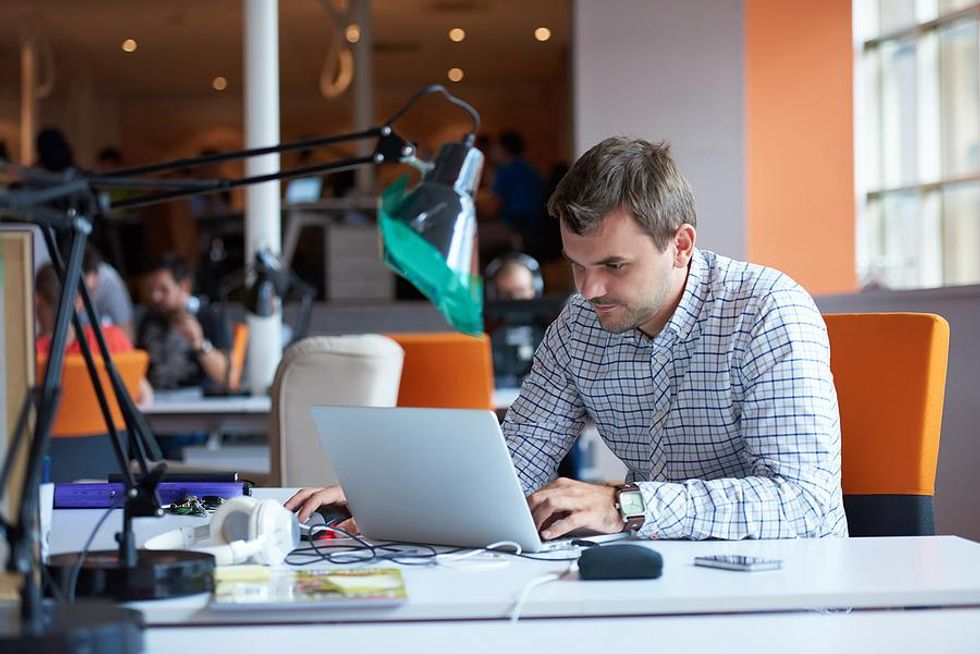 Man tries to be productive at work