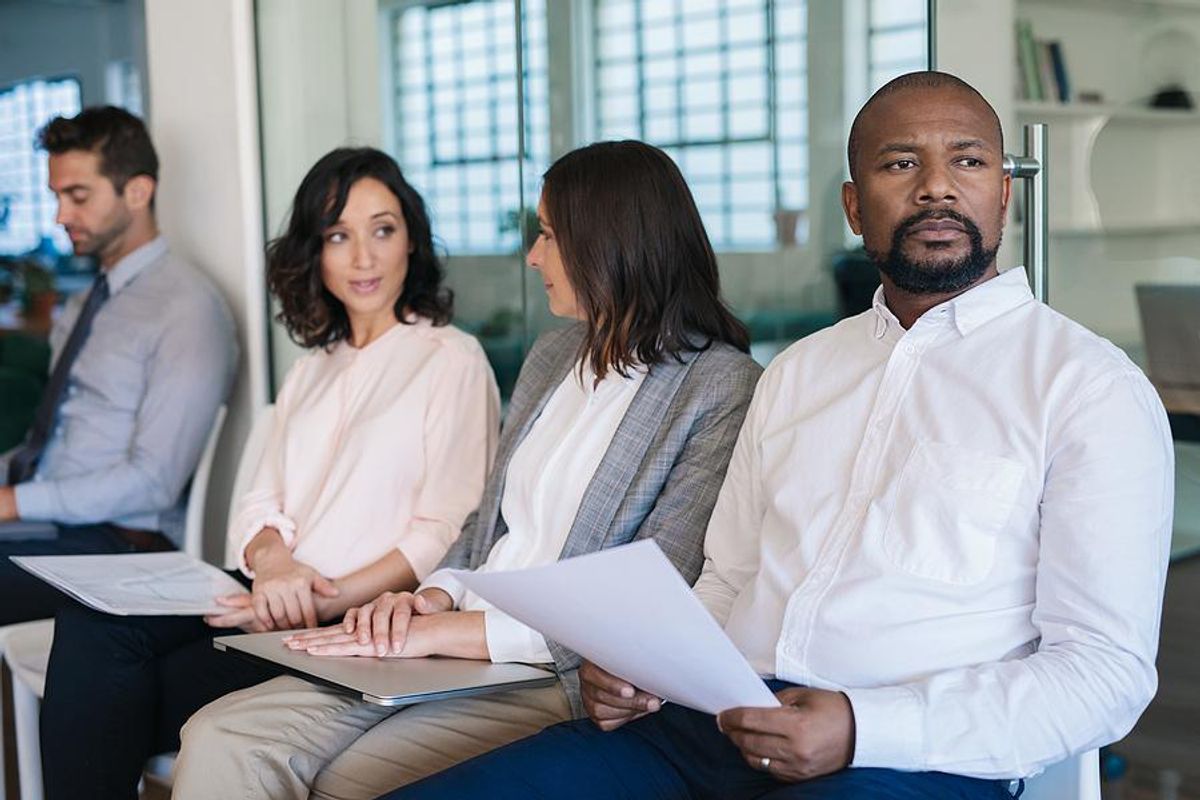 Man with a criminal record waits for a job interview