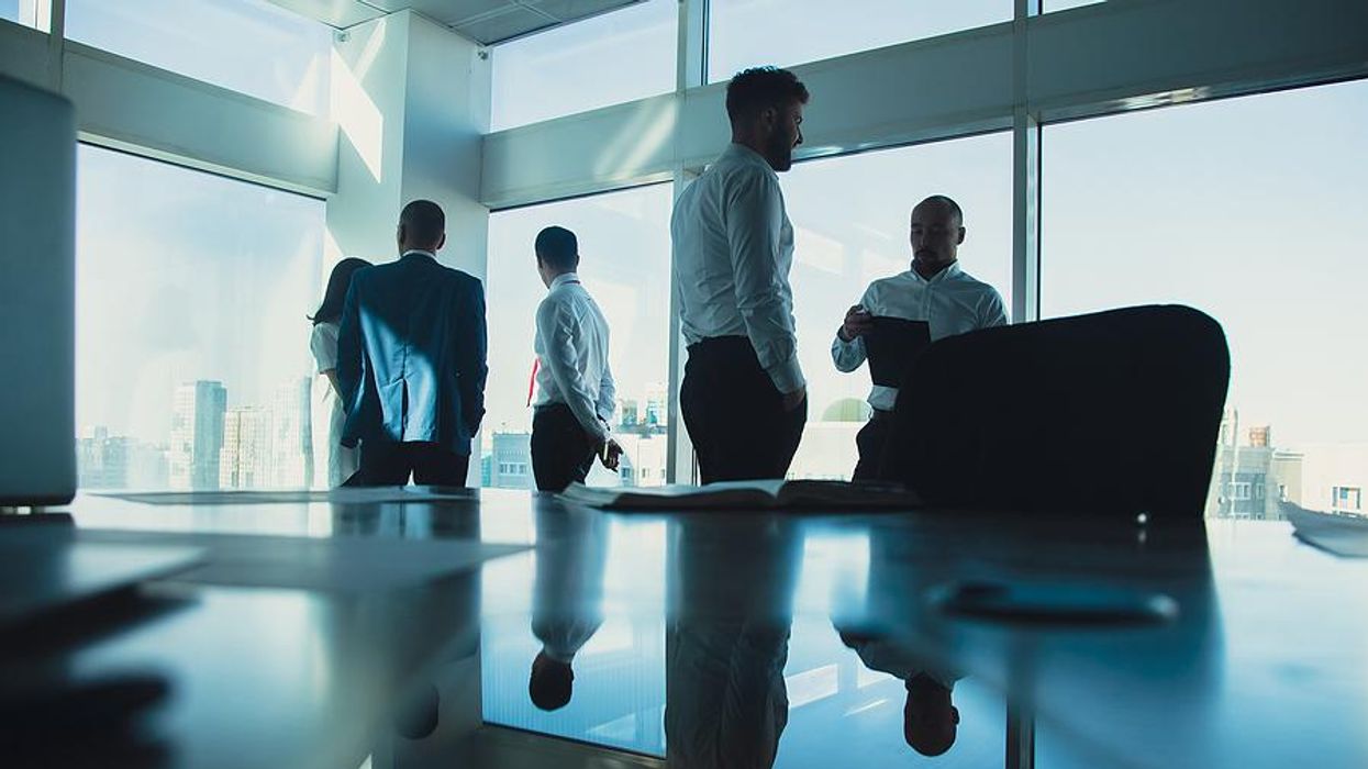 Man with autism tries to network during a work meeting