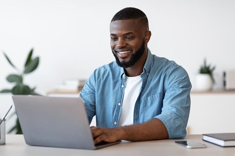 Man working remotely for his green job