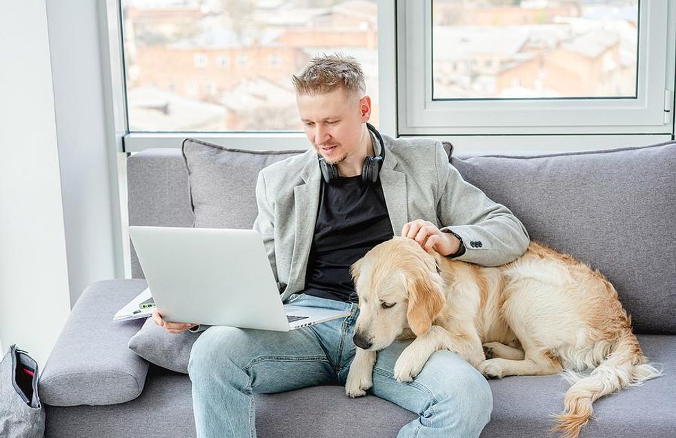 Man works from home for his hybrid job