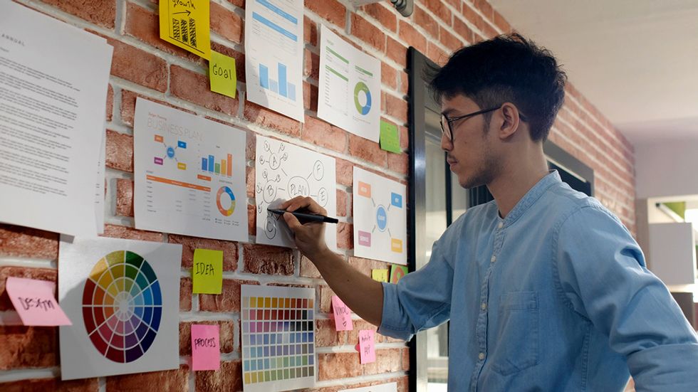 Man works on a project before leaving work