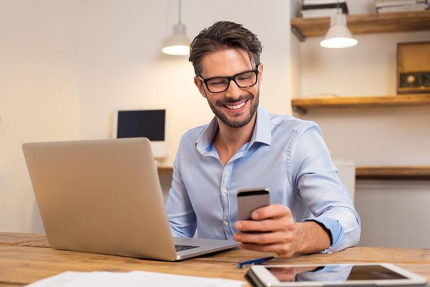 Man works remotely for a company that pays for his vacation