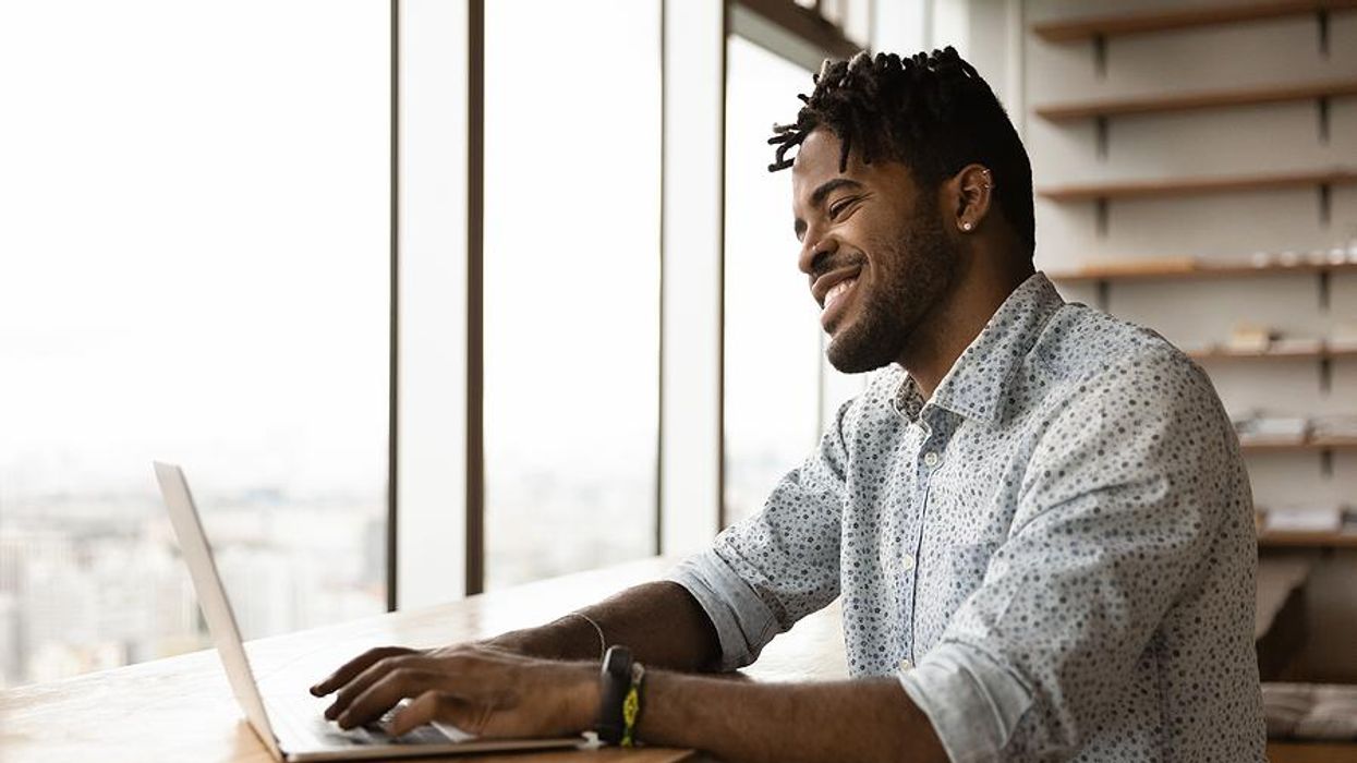 Man writes a cover letter that asks for the job interview