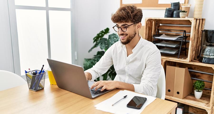 Man writes a LinkedIn endorsement for a colleague