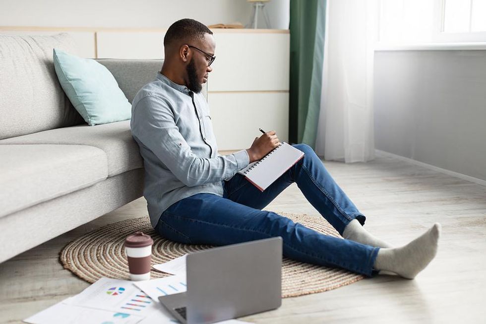 Man writes down his plan after getting a promotion