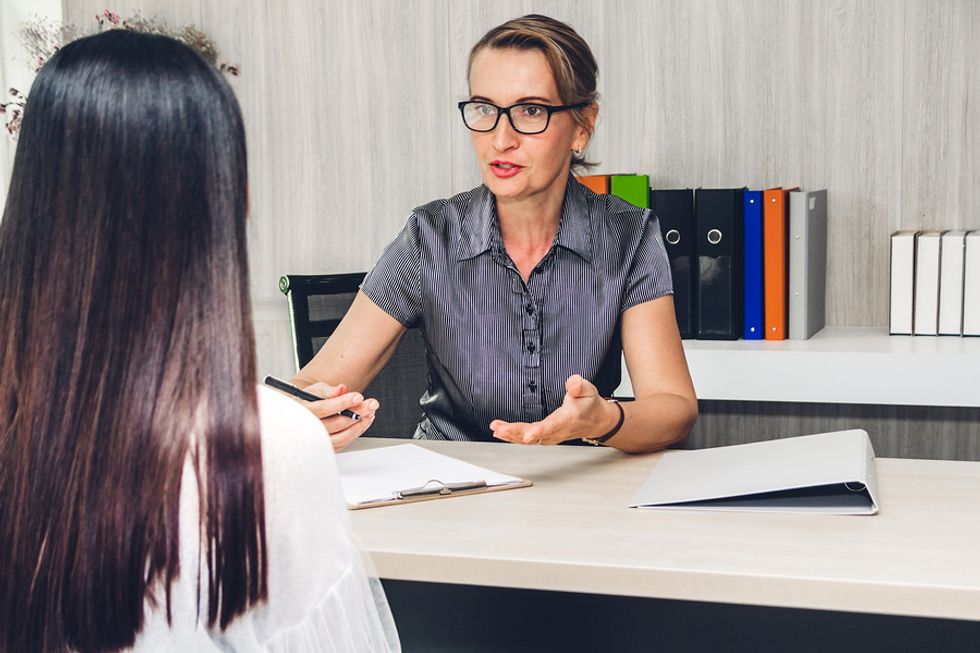 Manager/boss talks to her employee about her career goals