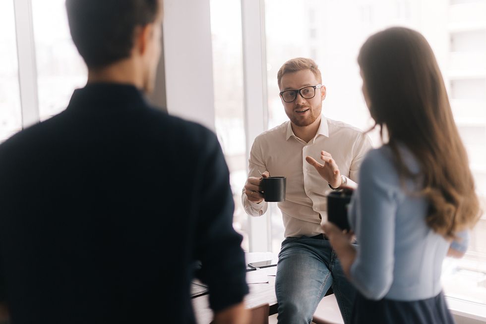 Manager delegates tasks to his team members