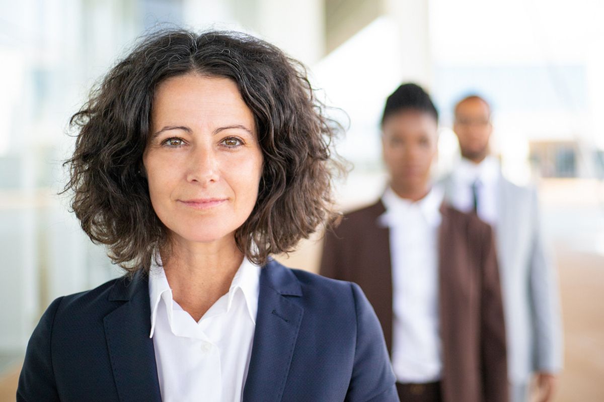 Manager developing her leadership skills in the office