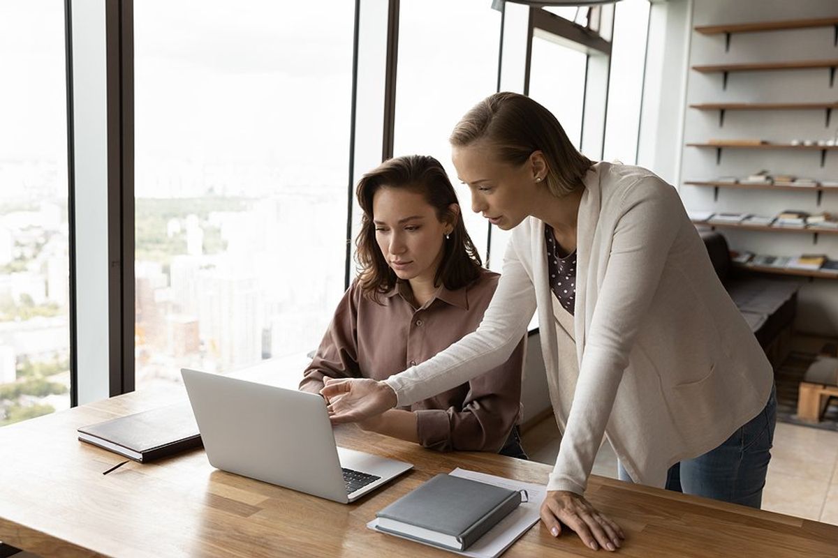 Manager trains/teaches new employee by following a training plan