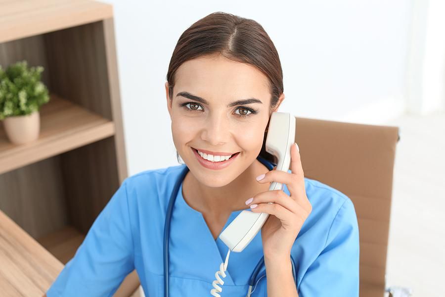Medical assistant answers the phone