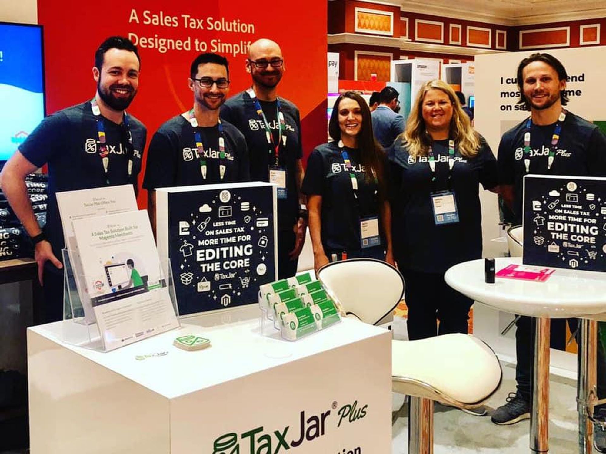 Members of the TaxJar team promote the company's products.