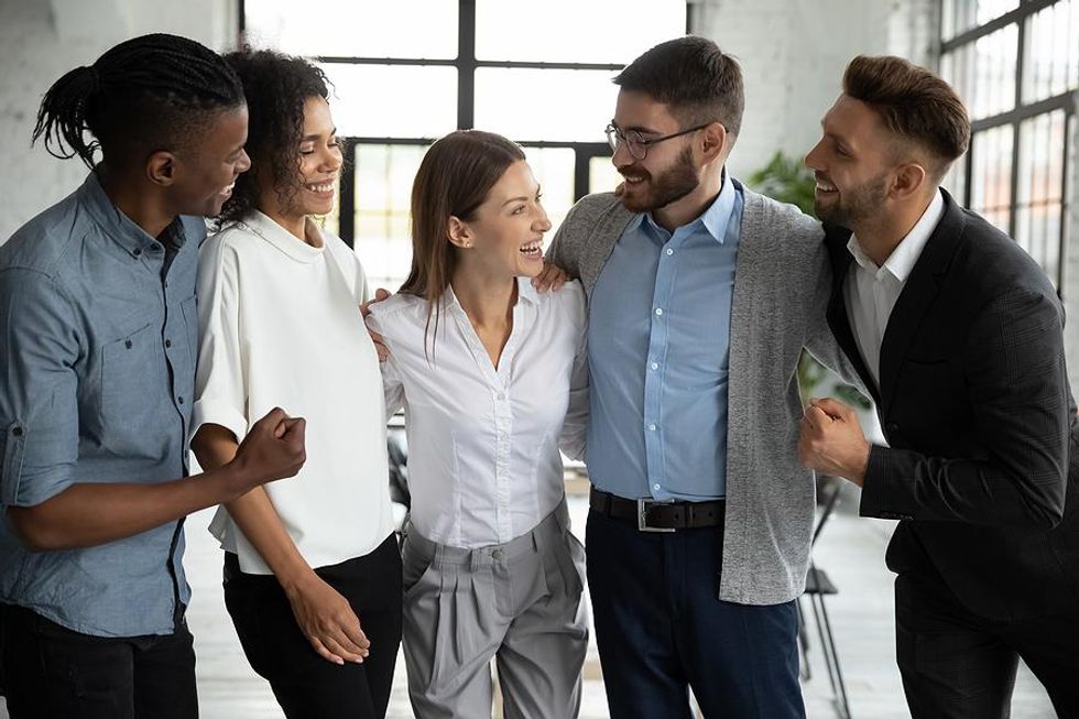 Motivated team has fun at work