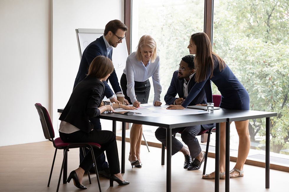 New and seasoned executives in a meeting