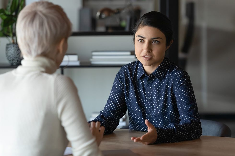 New manager fires an employee during a meeting