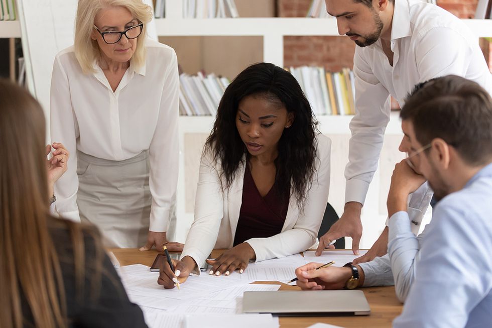 New manager leads a business meeting