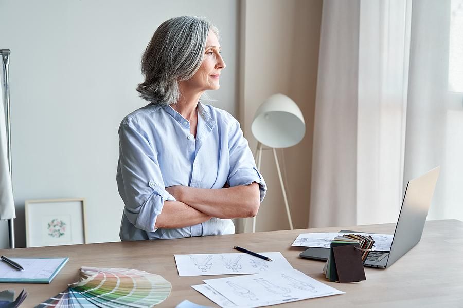 Older professional woman thinking about retirement
